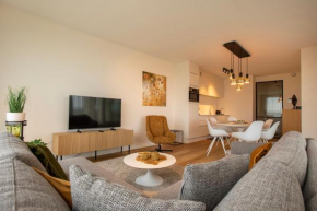 Modern en gezellig appartement vlak aan het strand
